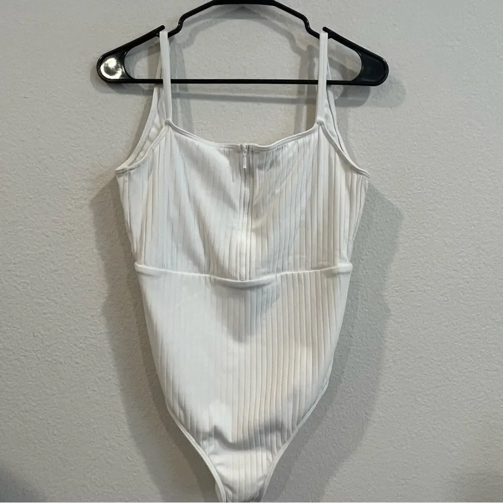 Roxy size large white ribbed quarter zip swimsuit square neck excellent cond.